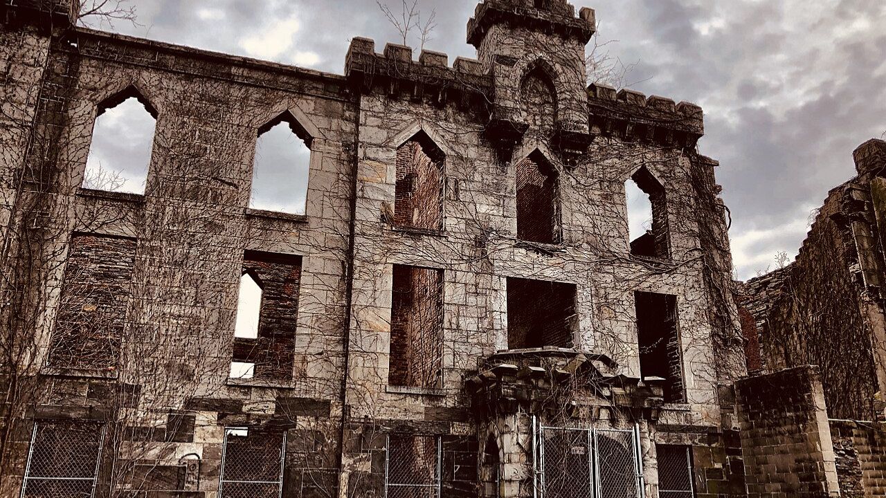 Smallpox Hospital ruins with Gothic stone arches on Roosevelt Island. 