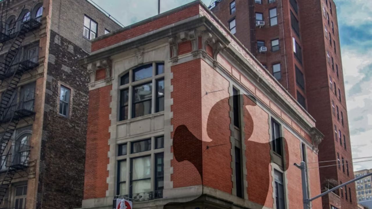- Ghostbusters Firehouse in Tribeca with red door and logo.
