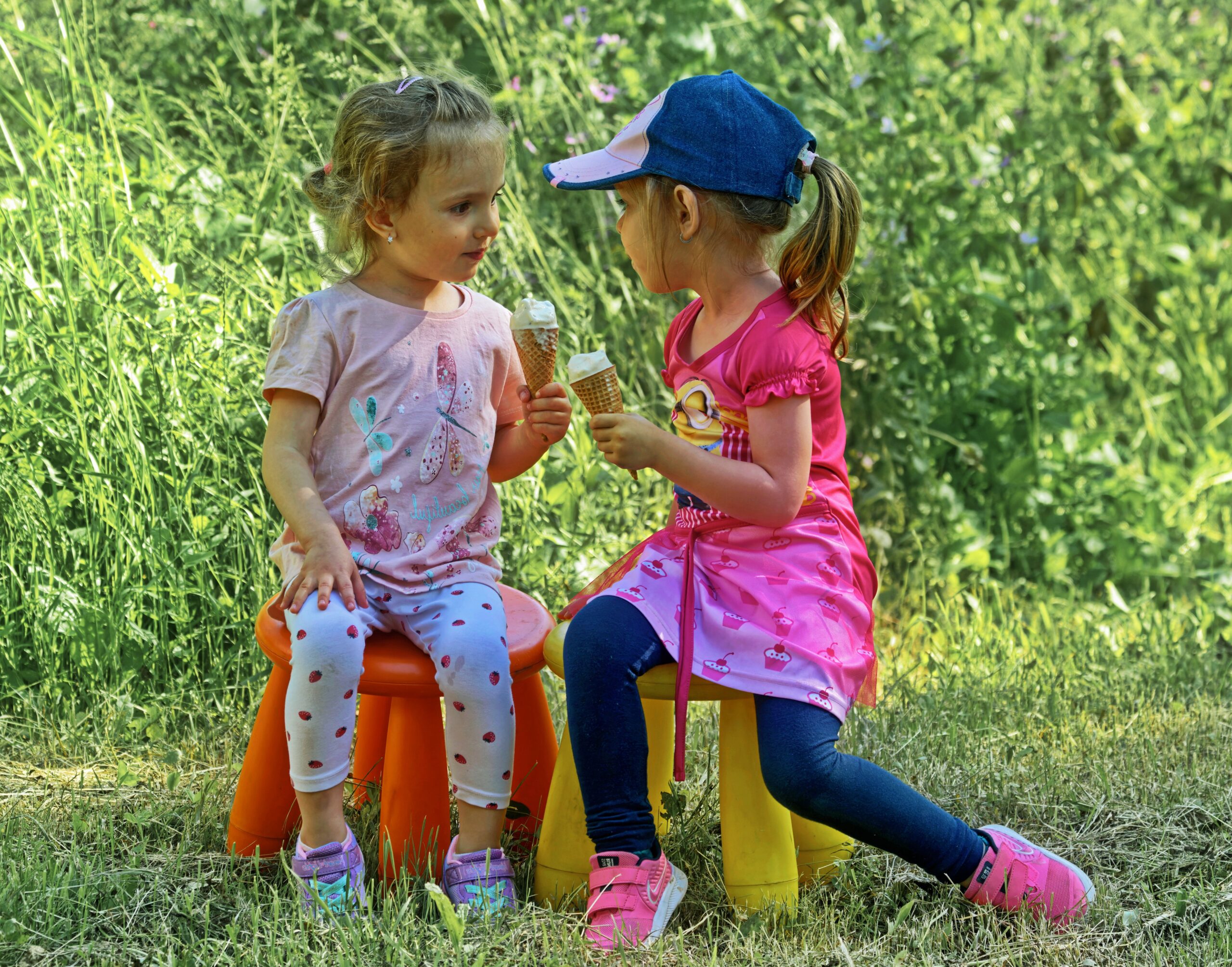 Happy children eating ice cream on a New York City street