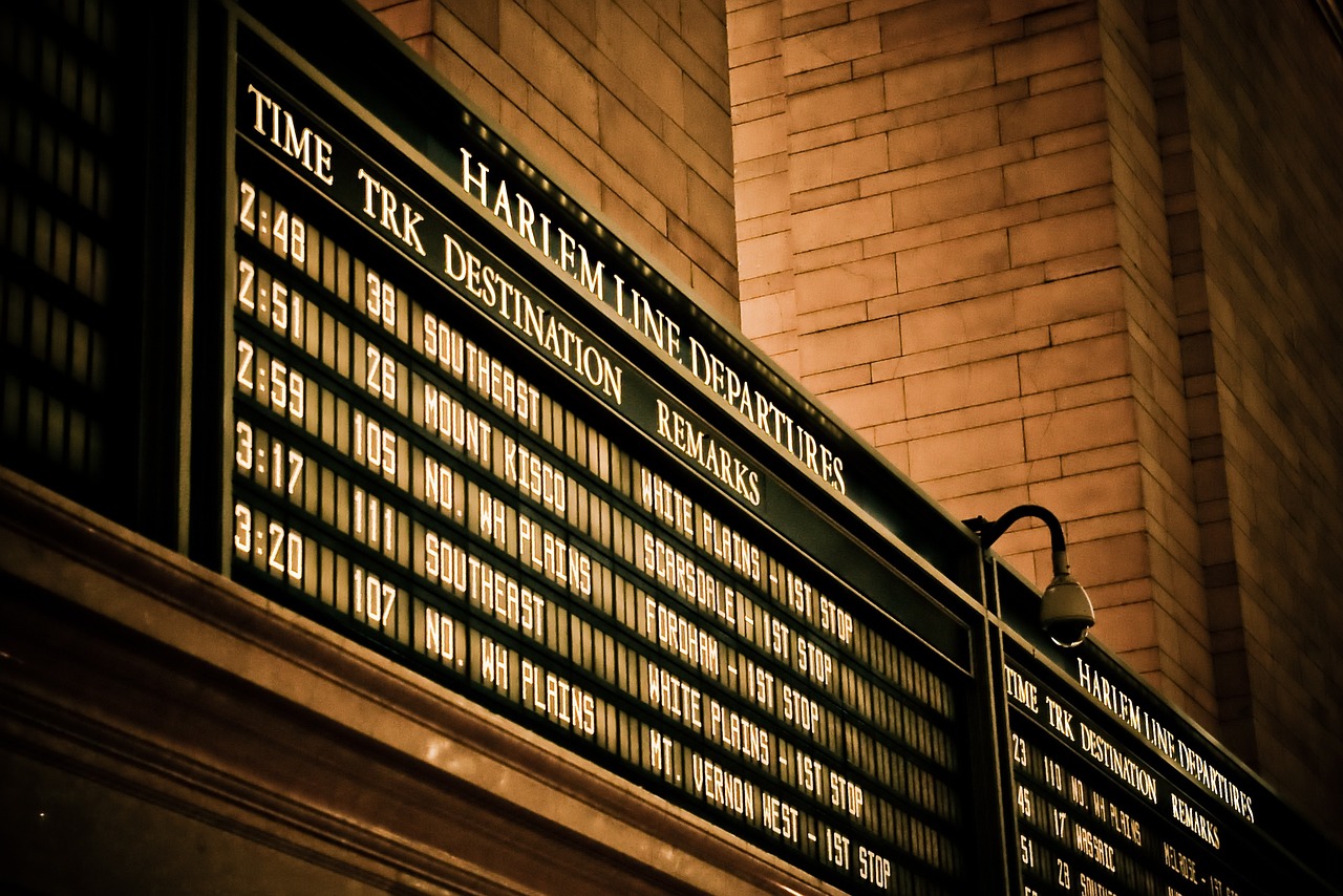 Grand Central departure board listing Harlem Line trains