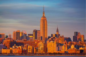 Manhattan skyline at golden hour featuring the Empire State Building.