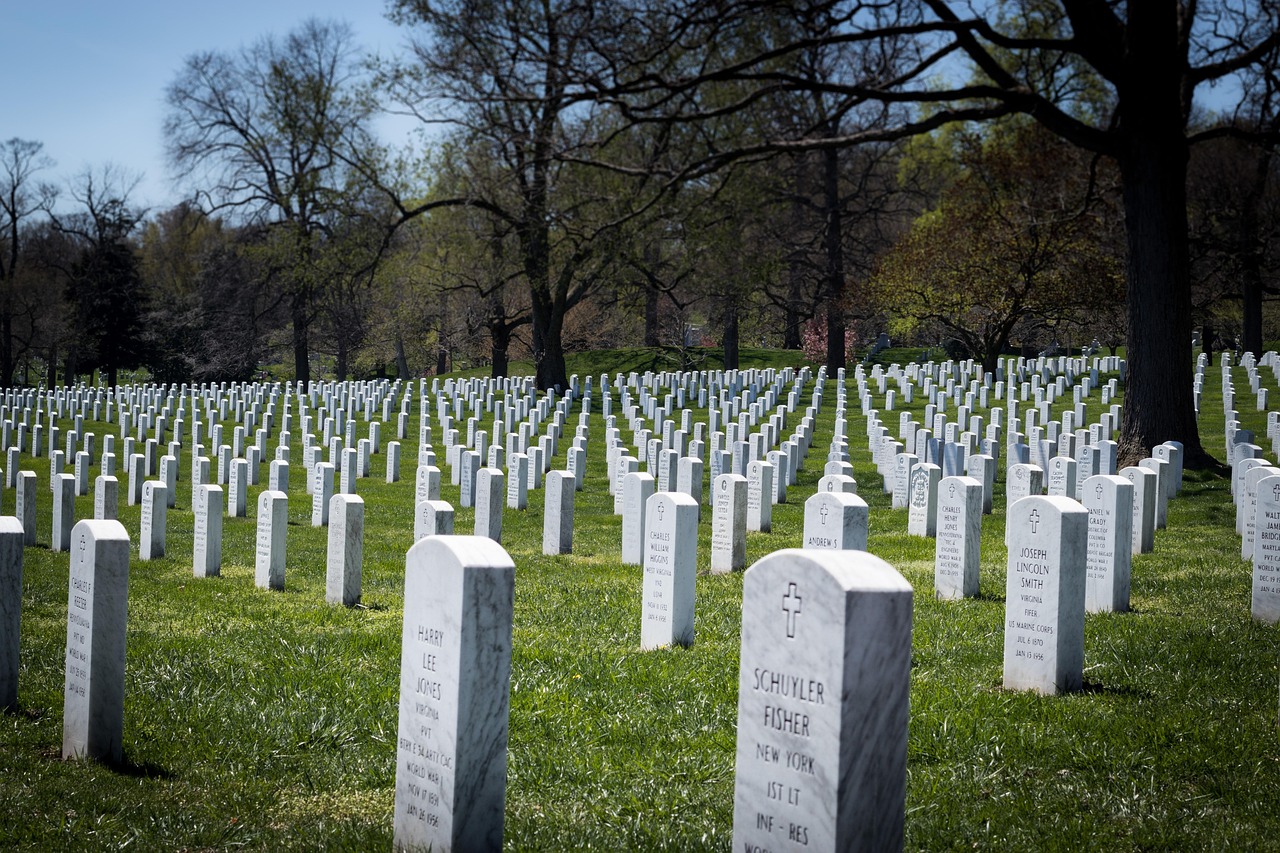Rows of white headstones at Arlington National Cemetery
