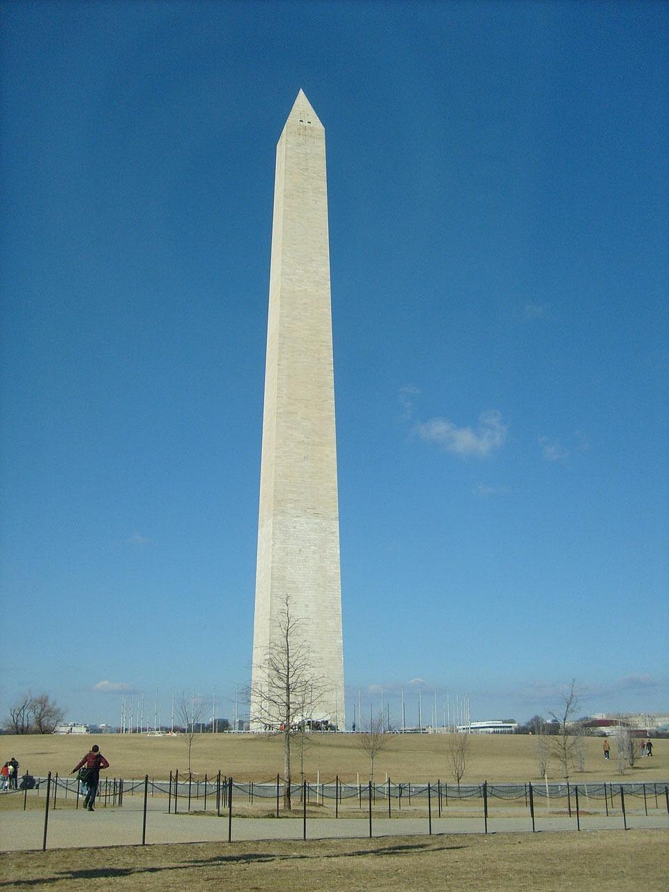Washington Monument rising against a deep blue sky