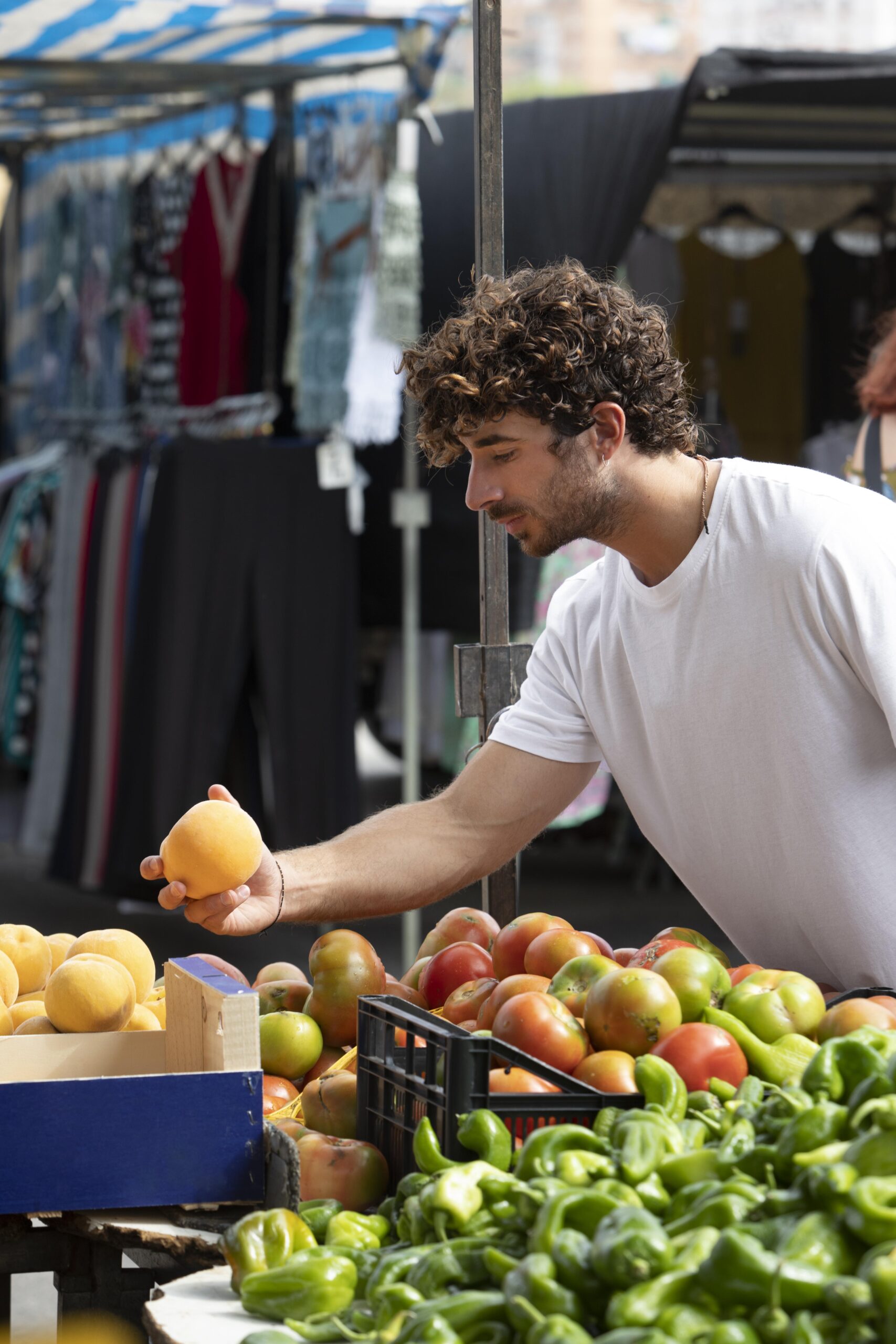 Close up on young man at the food market